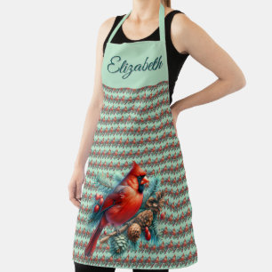 Tablier Cardinal sur la branche des pins avec les baies d'