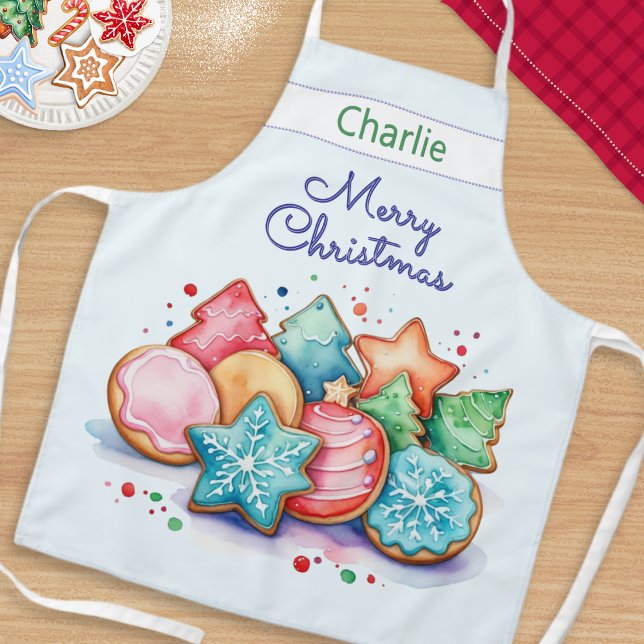 Tablier Cookies Festifs Joyeux Noël Personnalisés (A personalized kitchen apron, with colorful Christmas cookies illustration in a watercolor style)