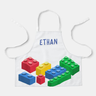 Tablier Des enfants colorés par des briques construites p