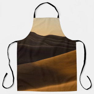 TABLIER DÉSERT PENDANT LE COUCHER DE SOLEIL