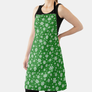 Tablier Flocons blancs sur motif vert d'hiver