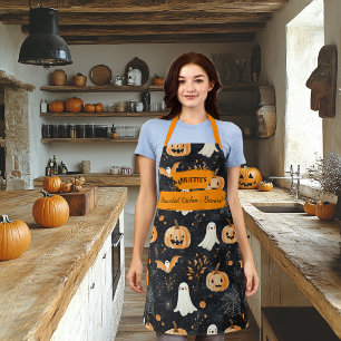 Tablier Halloween noir avec fantômes, citrouilles et chauv