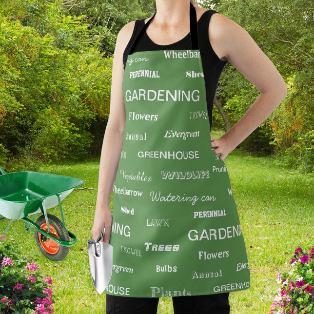 Tablier Jardin Jardin Vert Et Élégant (A stylish apron for garden lovers, patterned with gardening related words on a green background)