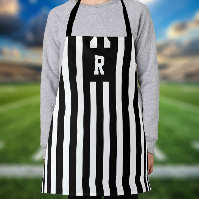 Tablier Jeu d'arbitre de football pour enfants noir et bla (Hup! Add your initial to this black and white striped apron. Perfect for fair play in the kitchen)