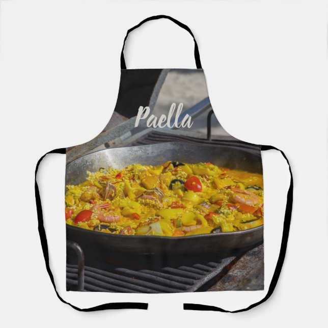 Tablier La paella est cuite sur un cadeau grill pour le ch (Recto)