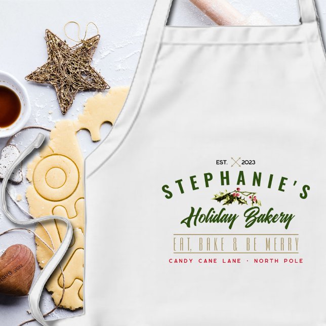 Tablier Long Logo de la boulangerie de Noël (Close up detail of the personalized bakery logo on this holiday baking apron.)