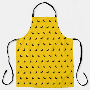 Tablier Silhouettes de petites bananes noires sur fond jau