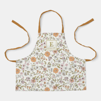 Tabliers à motif floral monogramme de fleurs sauva
