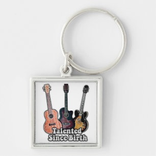 Talented since birth. vintage colourful guitar keychain