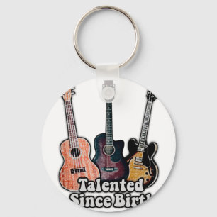 Talented since birth. vintage colourful guitar keychain