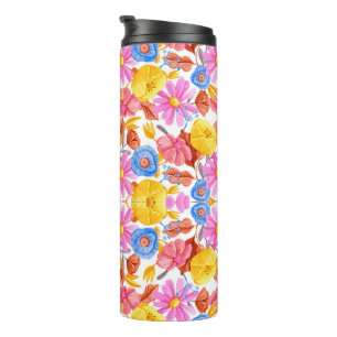 Tall travel mug featuring a vibrant floral pattern