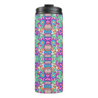 Tall travel mug with a vibrant, symmetrical floral