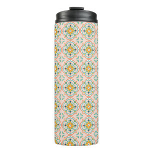 Tall tumbler with a black lid featuring a colourfu