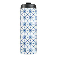 Tall, white travel mug with a black lid