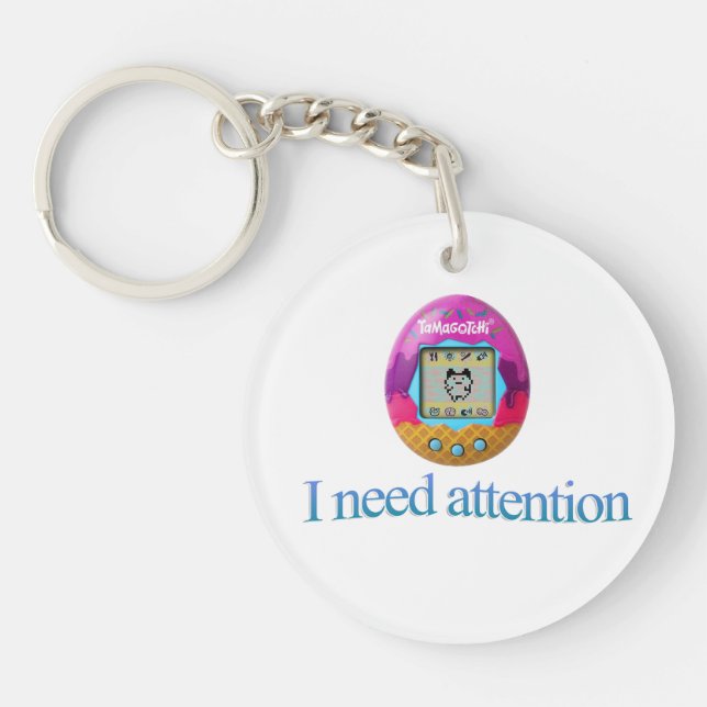 Tamagotchi "J'ai besoin d'attention" (Devant)