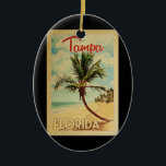 Tampa Palm Tree Vintage Travel Ceramic Ornament<br><div class="desc">A uniquely retro mid-century modern Tampa Florida art print in vintage travel poster style. It features a curved palm tree on sandy beach with ocean under a blue cloudy sky.</div>