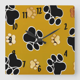 Tan and black paw print on a gold background #2 square wall clock