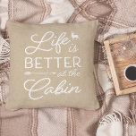 Tan & White Life Is Better At The Cabin Throw Pillow<br><div class="desc">Rustic modern throw pillow features a light tan beige background with "life is better at the cabin" overlaid in white typography. Personalize the reverse side with your family name and year established.</div>