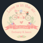 Tandem Bicycle, Birds and Banner Wedding Classic Round Sticker<br><div class="desc">Custom personalized bicycle wedding stickers, which can be used as envelope seals for wedding invitations or as stickers for your wedding favours. Elegant, romantic, personalized, stickers template with a cute, pink tandem bicycle with a basket of pretty, colourful flowers, and whimsical pink and blue cartoon birds with a love heart...</div>