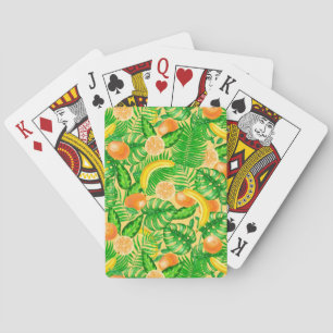 Tangerines, bananas and tropical leaves playing cards