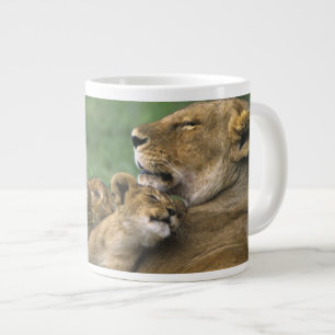 Tanzania, Ngorongoro Crater. African lion mother Large Coffee Mug