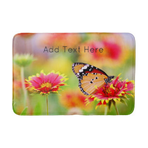 Tapis De Bain Le papillon Monarque sur la fleur rouge et jaune
