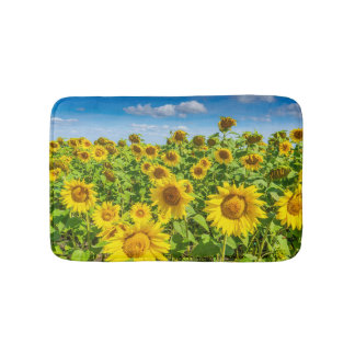 Tapis De Bain Terrain de tournesol, ensoleillé l'été.