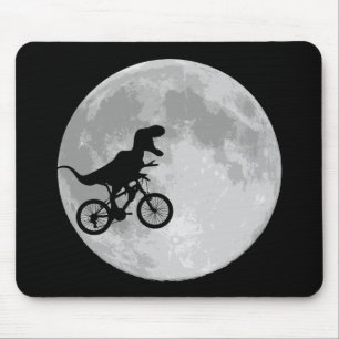 Tapis De Souris Dinosaure sur un vélo dans le ciel avec la lune