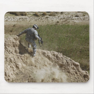 Tapis De Souris Le spécialiste s'élève vers le bas