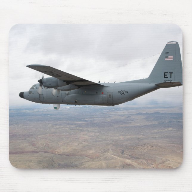 Tapis De Souris Un Hercules C-130 s'envole dans le ciel (Devant)