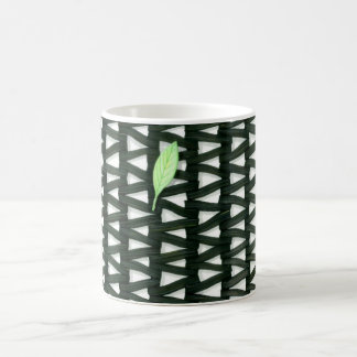 tapis et feuille sur une tasse