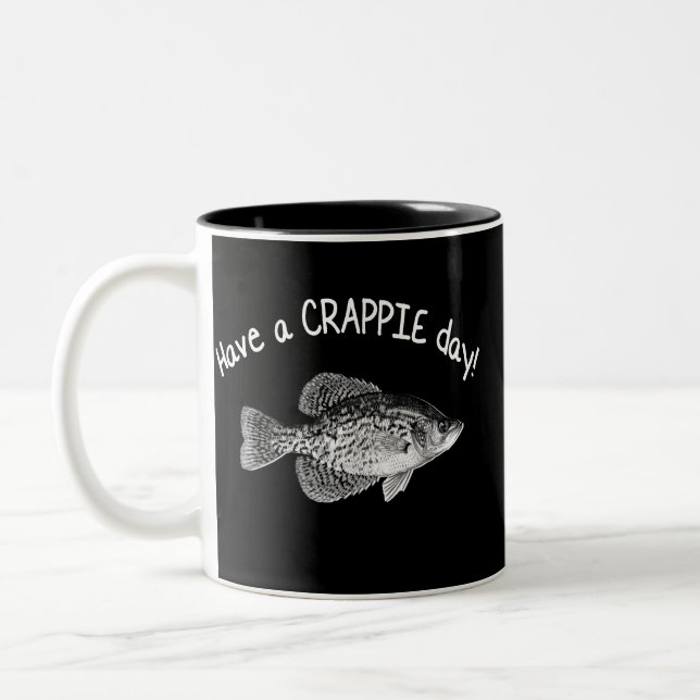 TASSE 2 COULEURS "AYEZ UNE PÊCHE DE CRAPET DE JOUR DE CRAPET" - (Gauche)