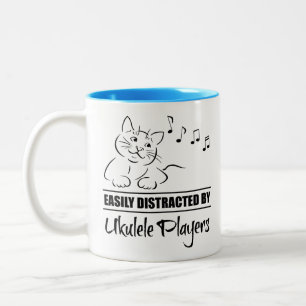 Tasse 2 Couleurs Chat curieux facilement distrait par des joueurs