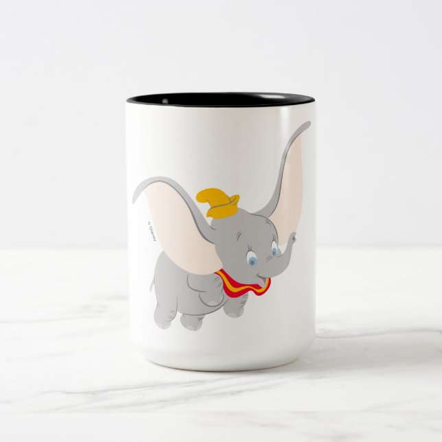 Tasse 2 Couleurs Dumbo qui vole dans le ciel (Centre)
