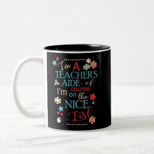 Tasse 2 Couleurs Le cadeau drôle de Noël de l'aide du professeur