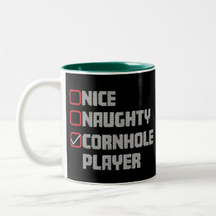 Tasse 2 Couleurs Liste de joueurs de cornhole Nice Naughty Noël dég