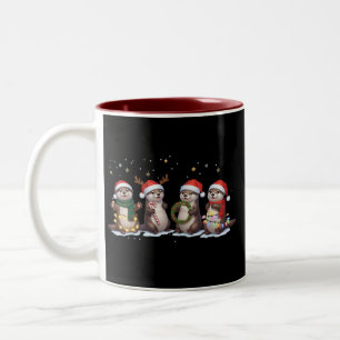 Tasse 2 Couleurs Loutres de Noël mignonnes avec chapeaux de Père No