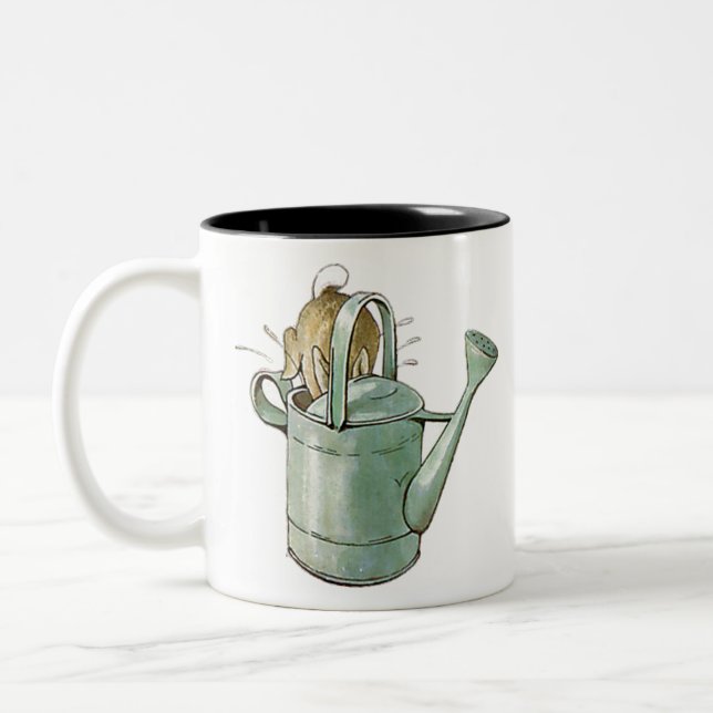 Tasse 2 Couleurs PETER RABBIT plongea la tête en premier dans la bo (Gauche)