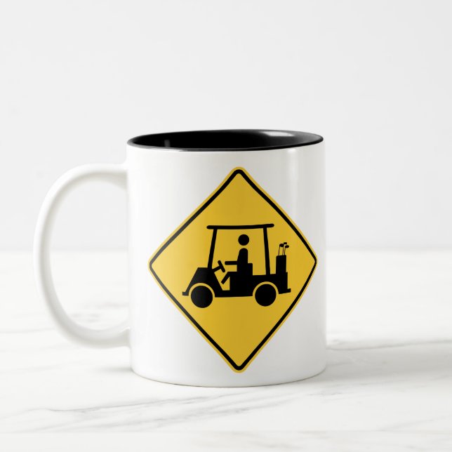 Tasse 2 Couleurs Symbole de prudence du panier de golf (Gauche)
