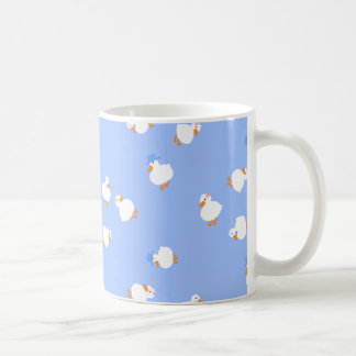 Tasse à café bleue avec canards mignons illustrés