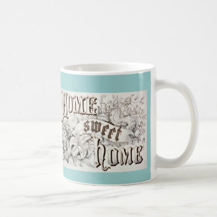 Tasse à la maison douce à la maison
