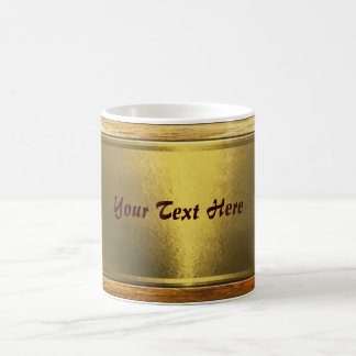 Tasse avec la fine couche d'or