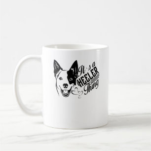 Tasse bleue de chose de Heeler