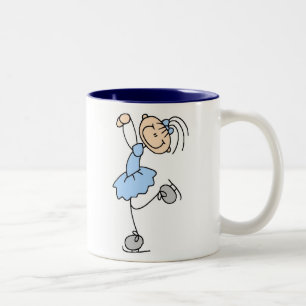 Tasse bleue de fille de patinage de glace