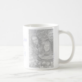 Tasse bleue de Noël de flocon de neige de photo