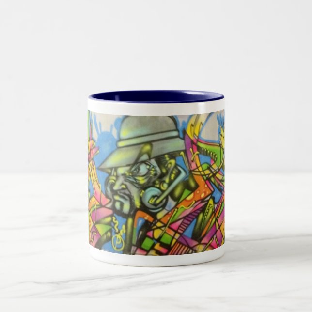 Tasse brûlante d'art d'homme par le ballot (Centre)