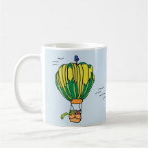 tasse chaude de ballon à air avec le chat et le