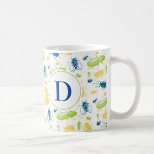 Tasse colorée de monogramme de nature d'insecte