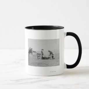 Tasse Cowboys stigmatisant un veau PhotographSouth