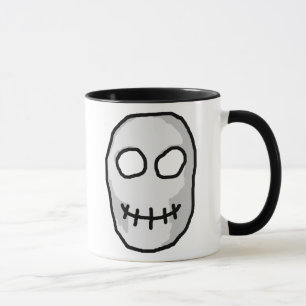 Tasse Crâne gris et noir en pierre. Style primitif